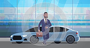 Businessman standing near luxury car african american man in suit holding suitcase going to work business concept flat