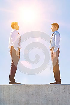 Businessman standing in office rooftop