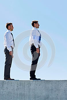 Businessman standing in office rooftop