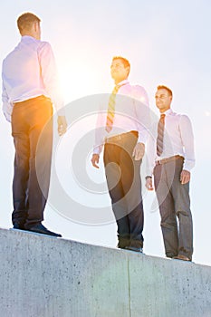 Businessman standing in office rooftop