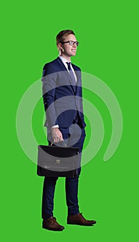 Businessman standing over chroma key background. Business, career job concept.