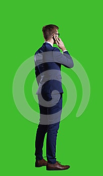 Businessman standing over chroma key background. Business, career job concept.