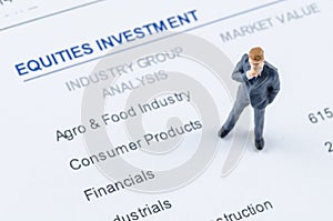 Businessman standing on the portfolio investment