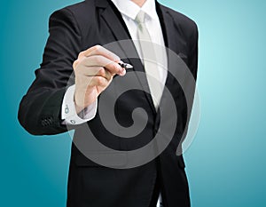 Businessman standing posture hand hold a pen isolated