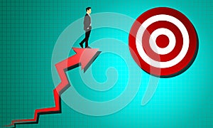 Businessman standing on red arrow target for success