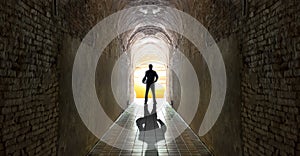 Businessman standing at tunnel, business strategy