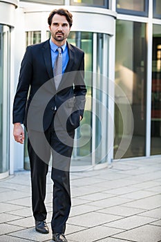 Businessman standing waiting for someone