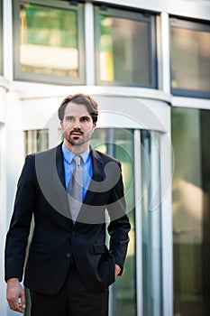 Businessman standing waiting for someone