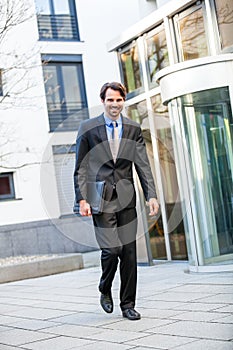 Businessman standing waiting for someone