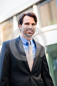 Businessman standing waiting for someone