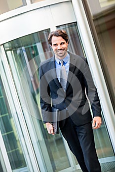 Businessman standing waiting for someone