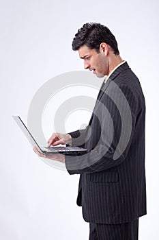Businessman standing and working