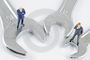 Businessman standing on the wrench, Problem solving co