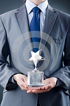Businessman with star award