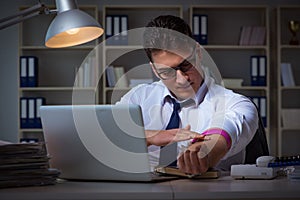 The businessman staying late in office for drugs