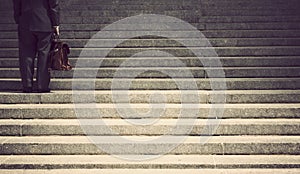 Businessman on steps