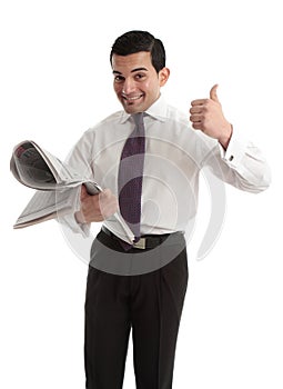 Businessman stockbroker with newspaper thumbs up