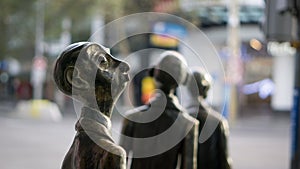 A businessman stops and wonders, as others continue their way in Melbourne`s CBD