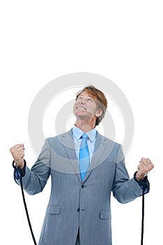 Businessman, studio and frustrated with rope on hands for bondage or hostage with struggle or stress. Male person, tied