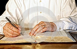 Businessman Studying the Bible