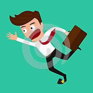 Businessman stumbling on rock