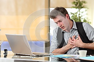 Businessman suffering a heart attack