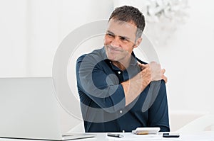 Businessman Suffering From Shoulder Pain