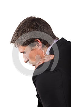 Businessman suffering from shoulder pain