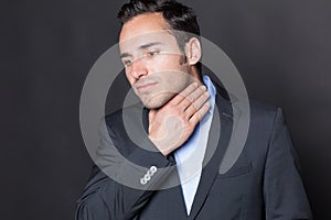 Businessman suffering from throat problems