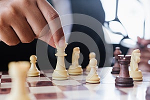 Businessman suit with chess board game.