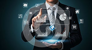 Professional Using Futuristic Technology Interface for Data Analysis and Global Connection