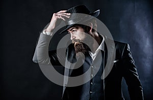 Businessman in suit. Mafia boss. in hat Mature hipster with beard. Male formal fashion. Stylish Mafia boss. caucasian