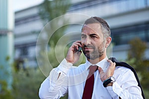Businessman in a suit on the phone
