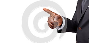 Businessman in suit points his index finger at an object, white background, space for text