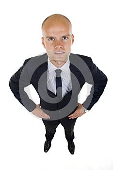 Businessman in suit stands with confidence