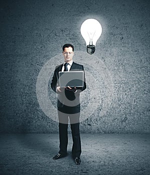 Businessman in suit using laptop