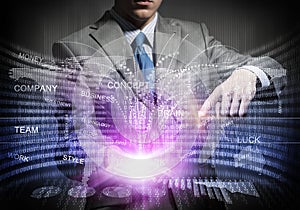 Businessman in suit using virtual interface