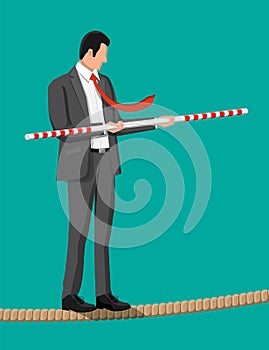 Businessman in suit walking on rope with balancer