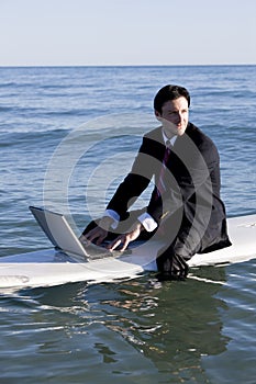 Businessman on Surfboard