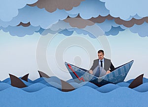 Businessman surrounded by sharks in stormy sea.