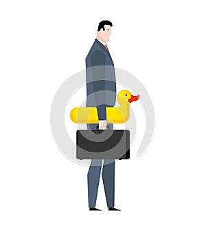 Businessman and swim ring duck. Manager on vacation