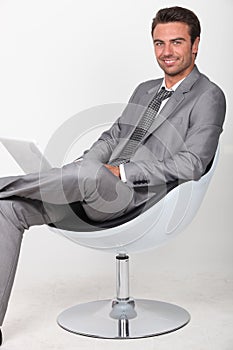 Businessman in a swivel chair