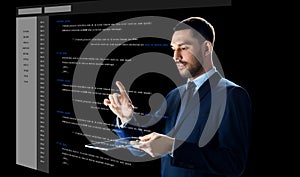 Businessman with tablet pc and virtual coding