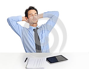 Businessman, tablet and tired rest at desk in studio for lunch break, nap or daydream after accounting planning, finance