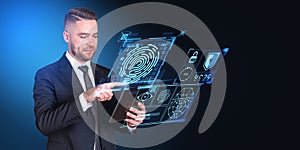 Businessman with tablet using fingerprint interface