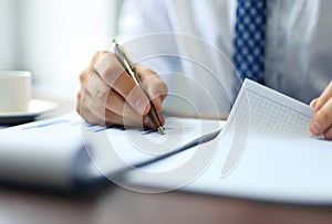 Businessman taking business notes