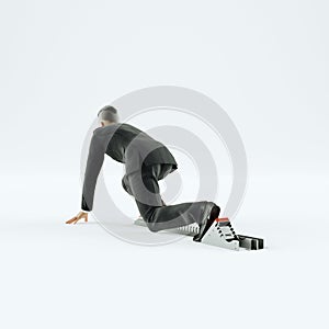 Businessman taking low start to running. On white background.