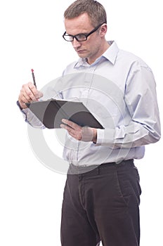 Businessman taking notes in his notebook