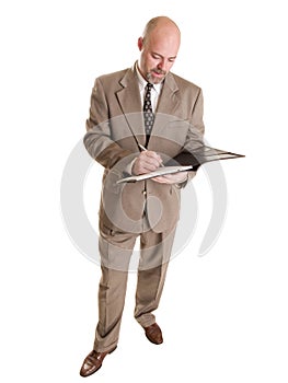 Businessman - taking notes on notepad