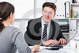 Businessman talking about business with woman